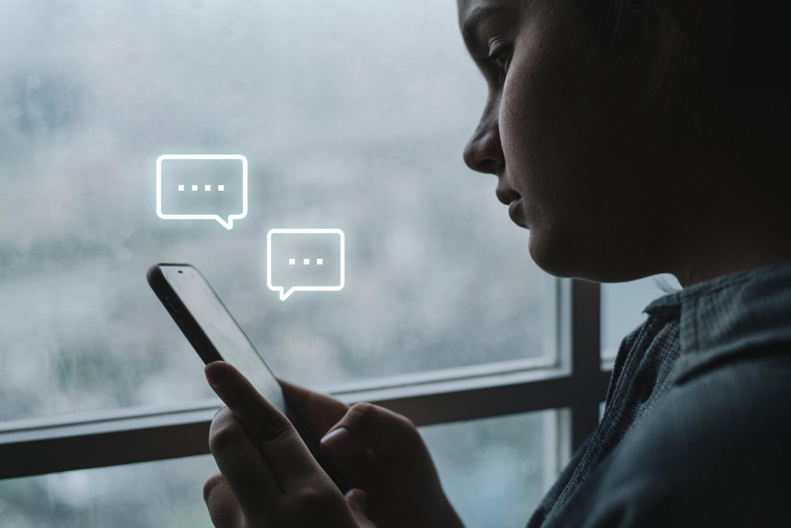 Girl texting friends to play an escape room on a rainy day